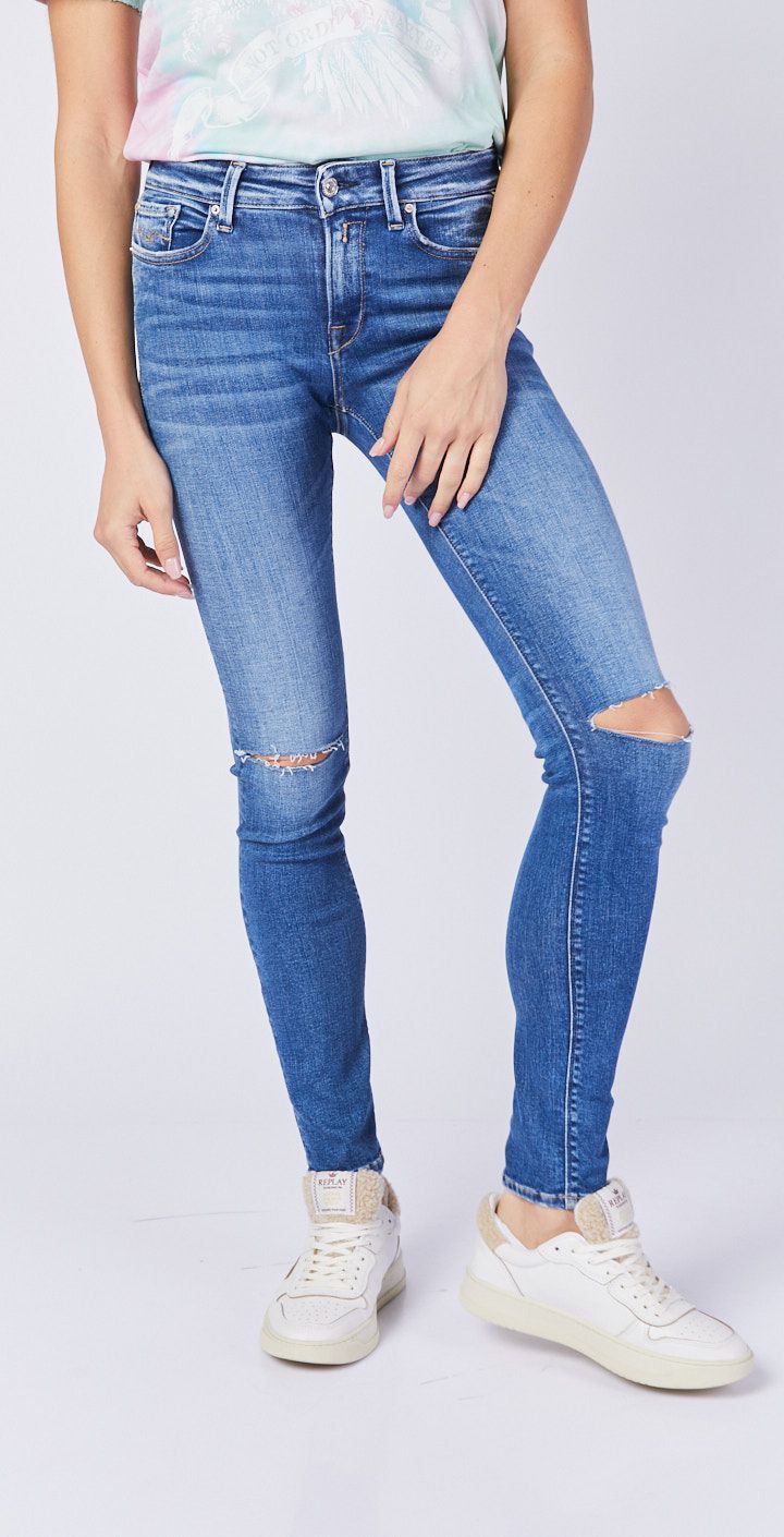 מכנסי ג’ינס סקיני עם קרעים נשים